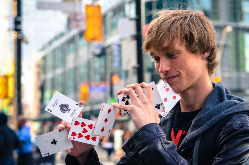 The Shell Game of a Street Corner Magician