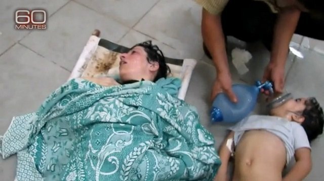 Syria rebels say scores dead in poison-gas attack